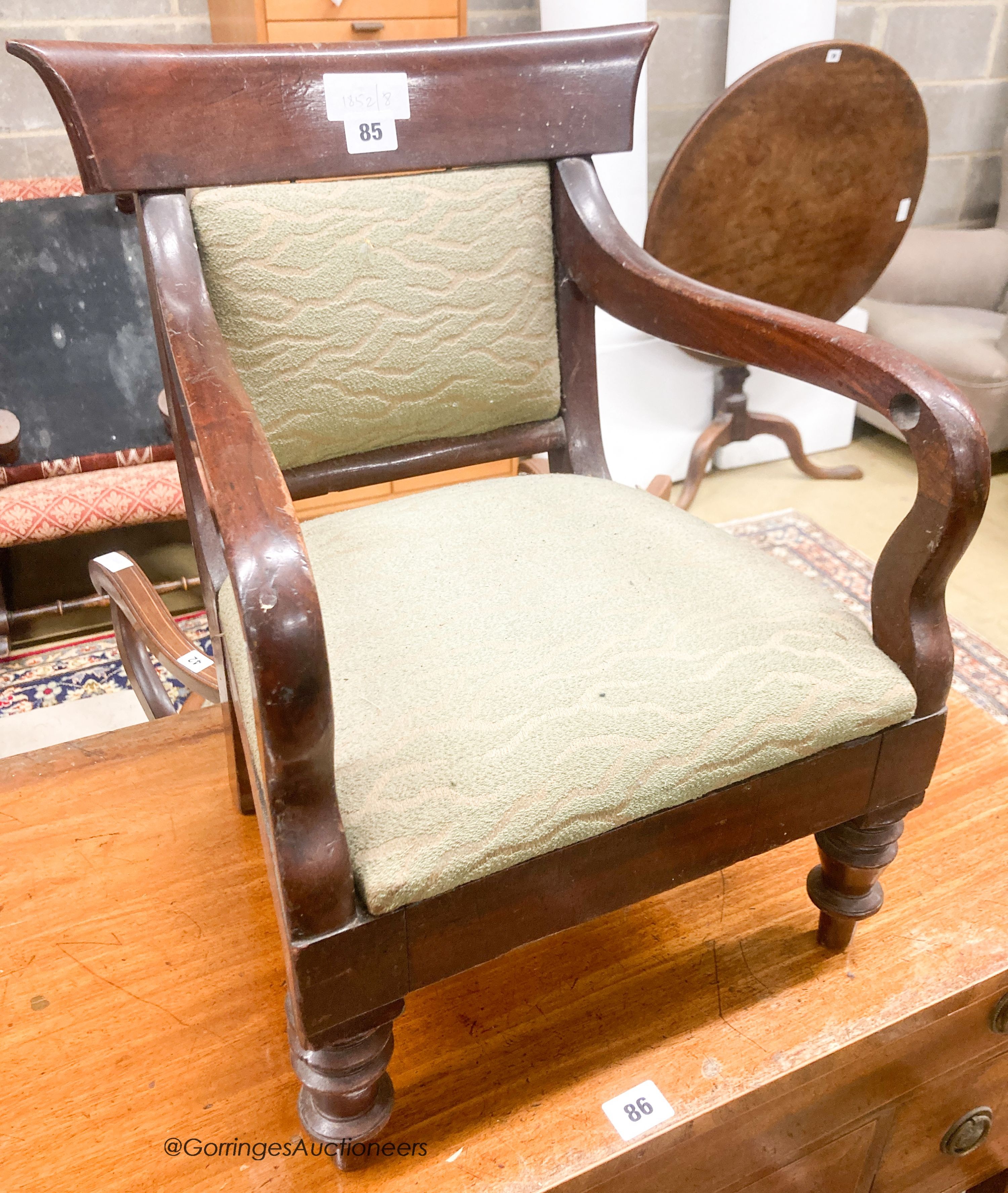 A Victorian mahogany child's elbow chair, width 38cm, height 49cm